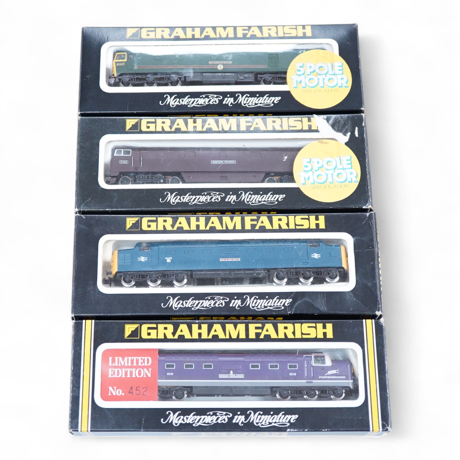Four boxed Graham Farish N gauge railway diesel locomotives; a BR class 50, Sir Edward Elgar 50007 (8406), a BR class 52, Western Courier D1062 (8426), a BR class 55, The Black Watch 55013, (8415) and a Porterbrook class